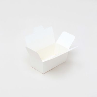 6.5x3.3x3.2cm. White fold flat box
