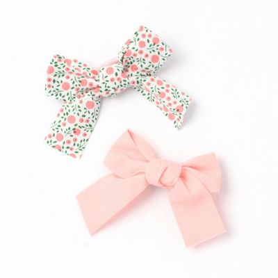 Card of 2 bow clips in 100% cotton. 5cm