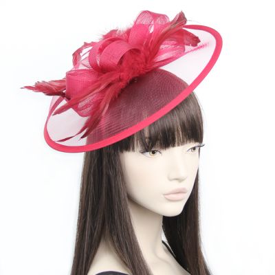 Style Doris. Ruby Red net and feather fascinator on an aliceband