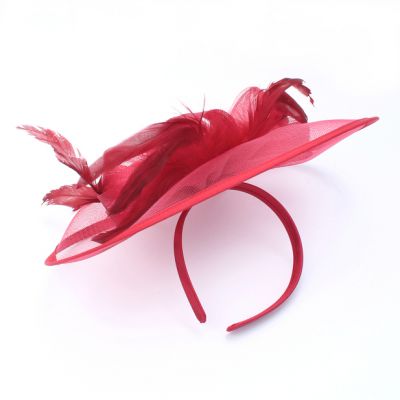 Style Doris. Ruby Red net and feather fascinator on an aliceband