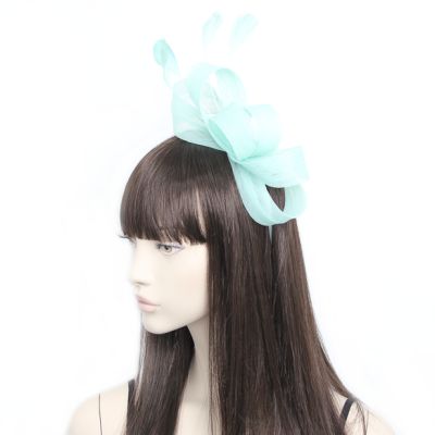 Style Ivy. Aqua looped fascinator on an aliceband