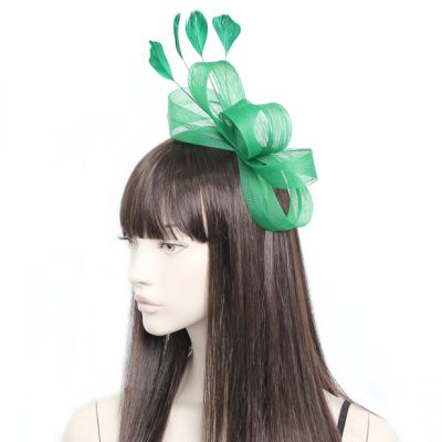 Style Ivy. Green looped fascinator on an aliceband