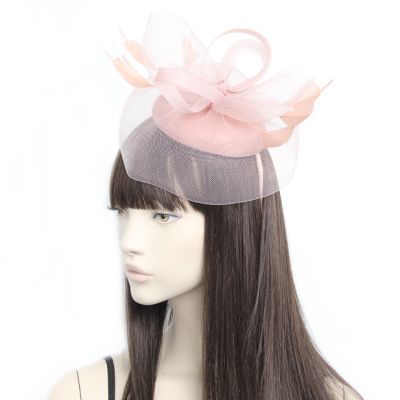 Style Sophia. Sinamay cap fascinator with net and feathers