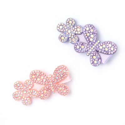 Card of 2 Diamante flower and butterfly beak clips 5cm