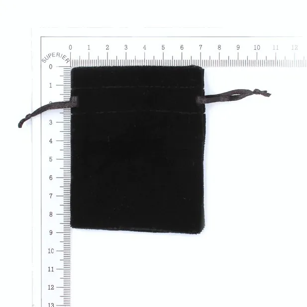9x7cm. Black velvet pouch