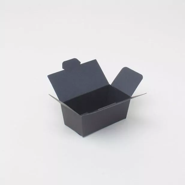 Empty chocolate box in plain black