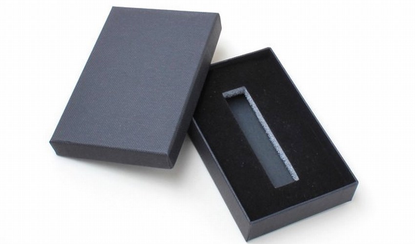 Black gift box with custom design.